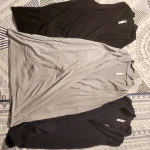 3 pack of Fabletics yoga racerback tanks